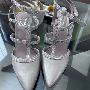 Tanish- gold with rhinestone T strap heels. Worn one time. Great used condition